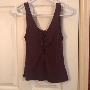 Burgundy tank top. Ties in front.